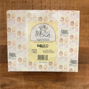 Enesco Brand New in the precious moments Box Angels On Earth ceramic 1996